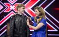 16-årige Cristian Oprea fra Sønderborg fremførte fredag aften Nenas '99 Luftballons' på tysk til andet liveshow i årets X Factor.
