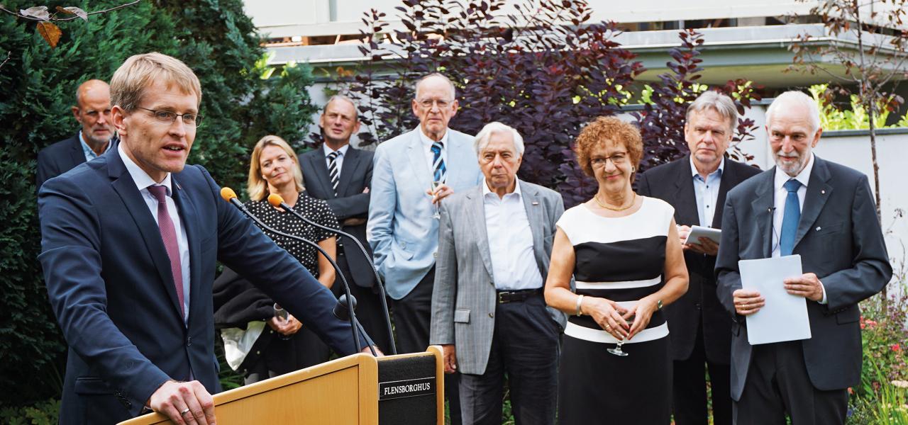 Den slesvig-holstenske ministerpræsident Daniel Günther (tv.) holdt tale ved Henrik Becker-Christensens (th.) afskedsreception i 2017.